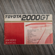 Illustration for article titled Hey, Let's Rob Some Banks To Buy This Perfect Left-Hand-Drive Toyota 2000GT